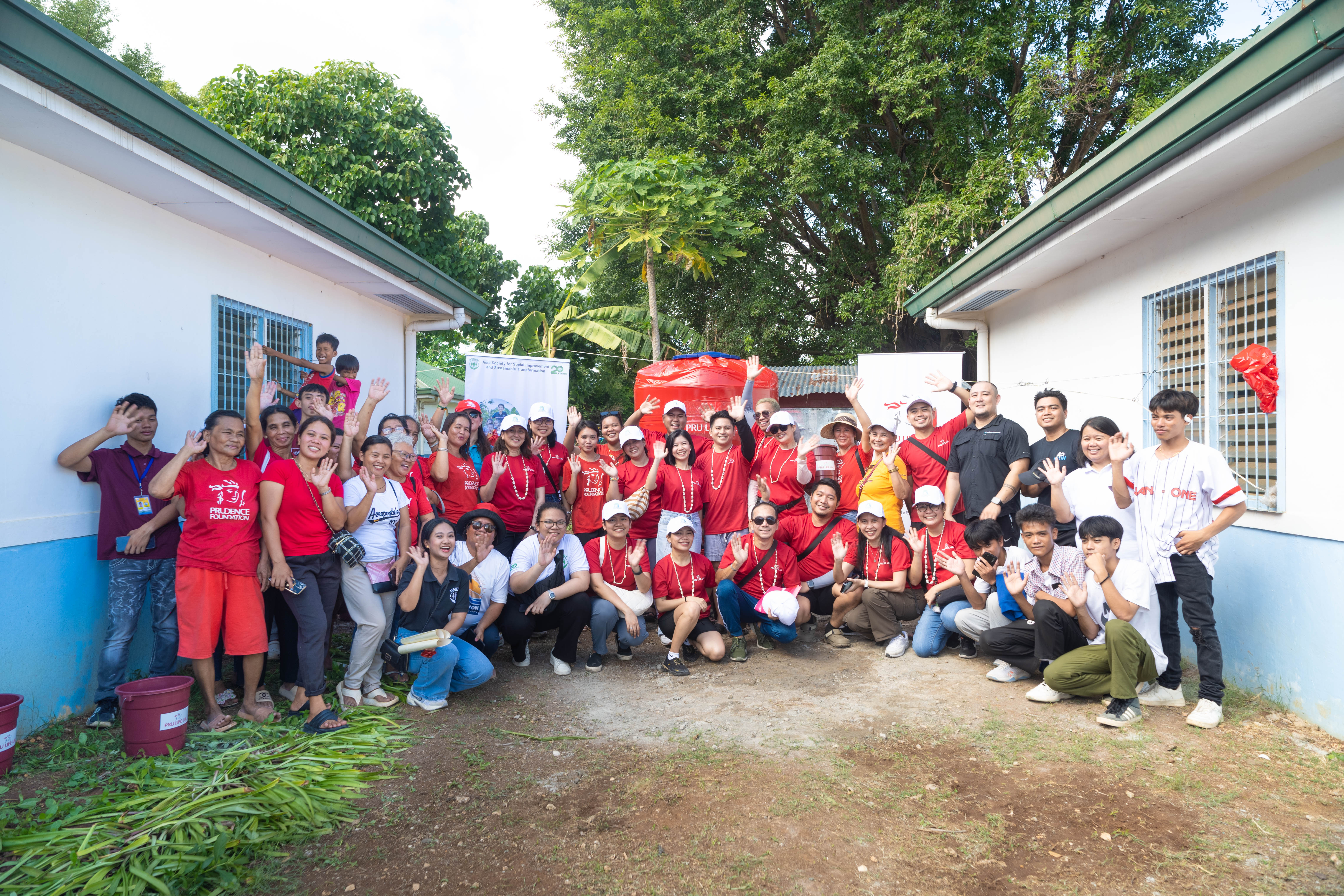 Pru Life UK turns over a water harvesting tank to one of its adopted communities in Bantayan Island, Cebu.