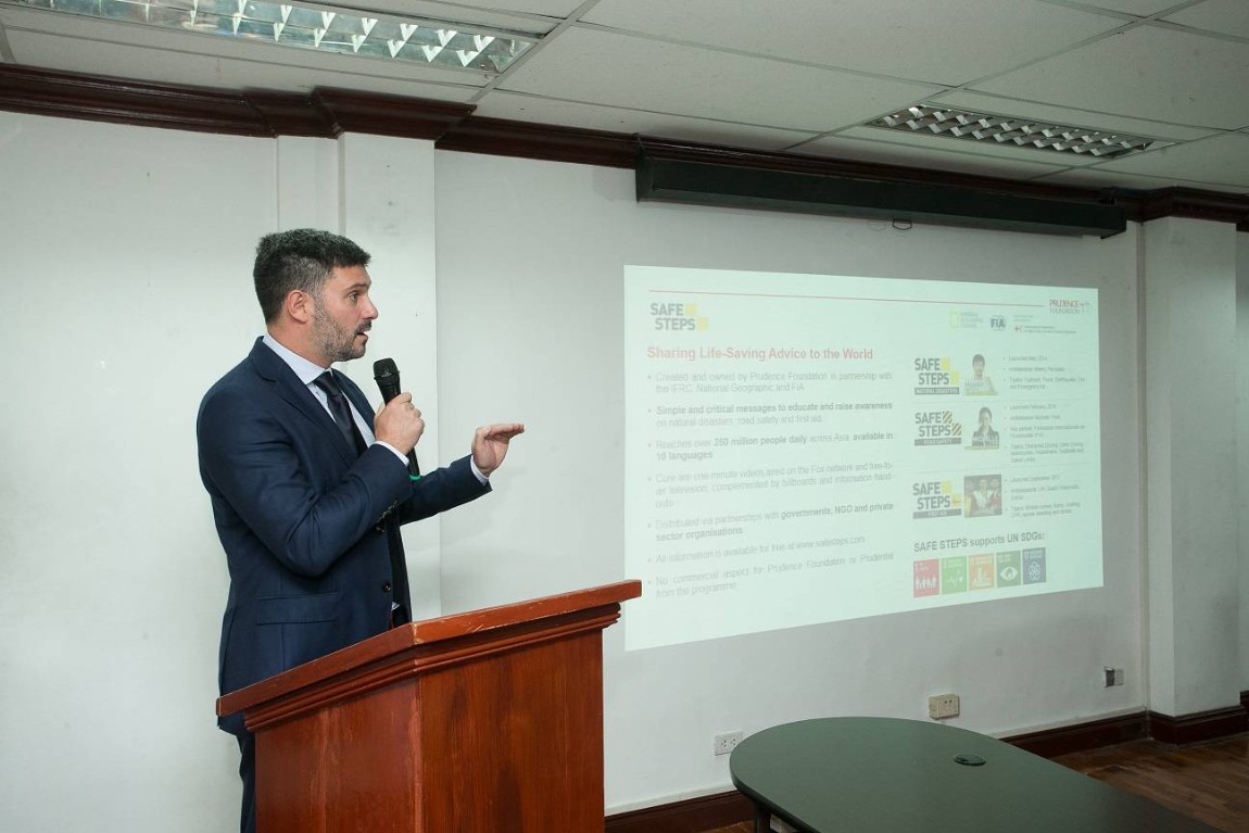 Giving a speech at the partnership ceremony