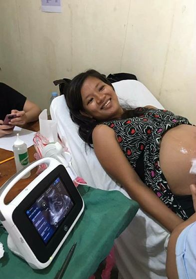 Pregnant women getting tested with new machine