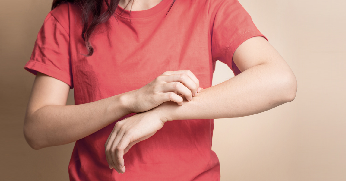 Person scratching arm