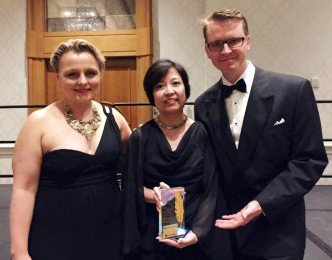 Anna Gizelle Camua receiving an award