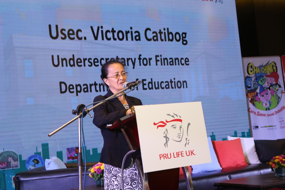 Victoria delivering speech at Cha-Ching conference