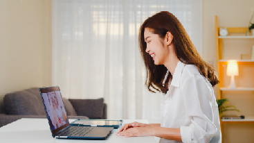 person at home with a laptop
