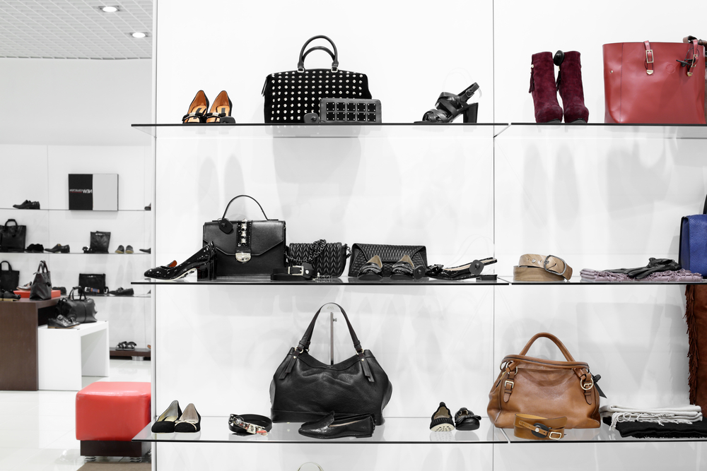 Department store shelves filled with fashion items