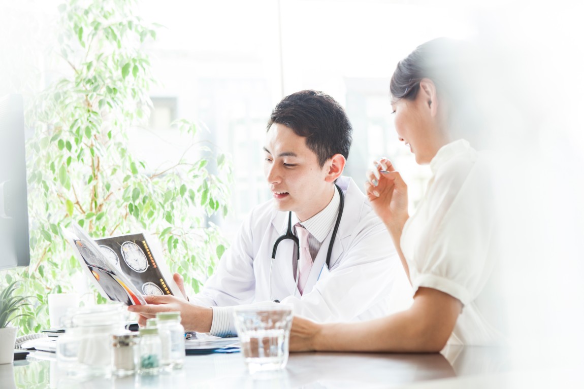A doctor showing results to a patient