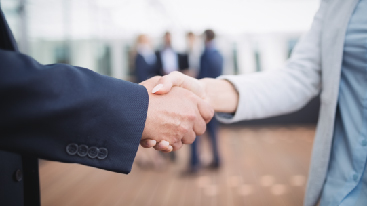 two people shaking hands