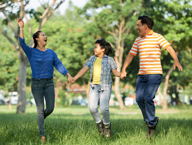 family taking a stroll at the park