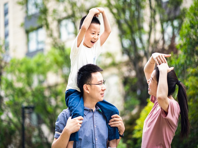 Family strolling at a park
