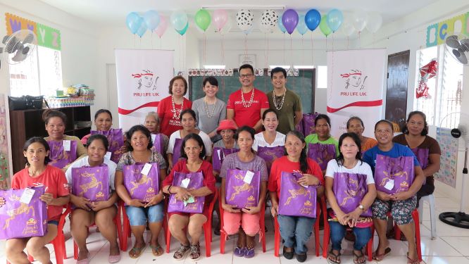 Pru Life UK officers at Bantayan Communities