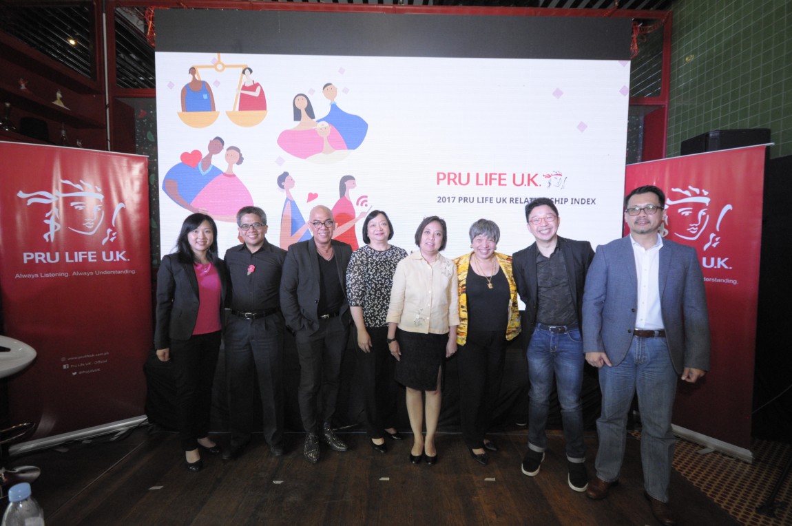 Executives posing along with the panelists