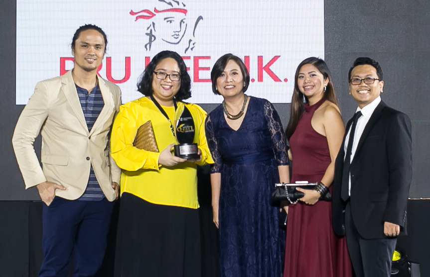 Pru Life UK team receiving the Award of Merit