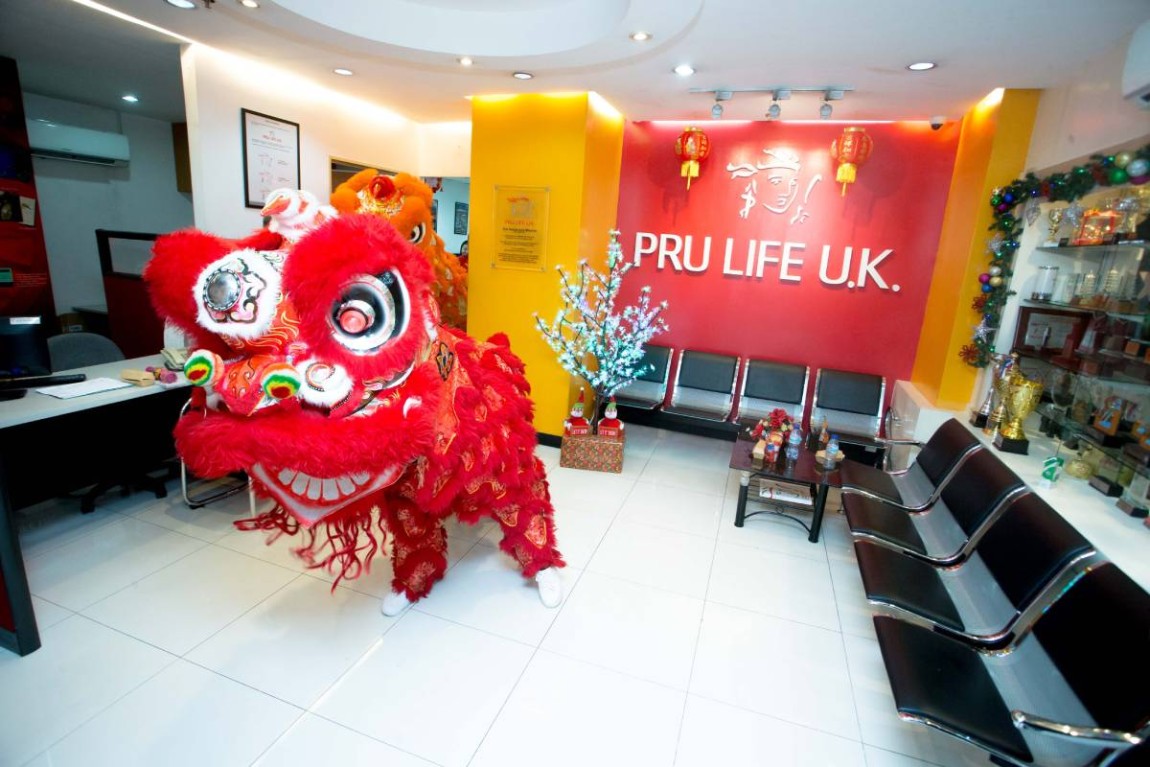 Lion dance at Pru Life UK Branch in Escolta