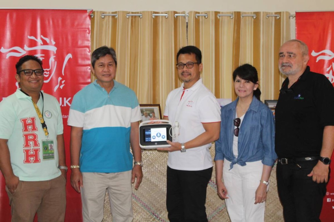 Executive and officers with new machine