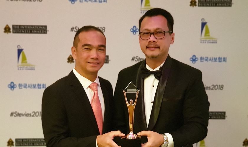 Receiving the bronze International Stevie