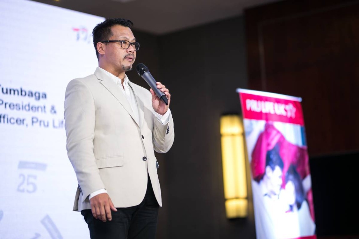 Allan Tumbaga speaking during PRULife term launch